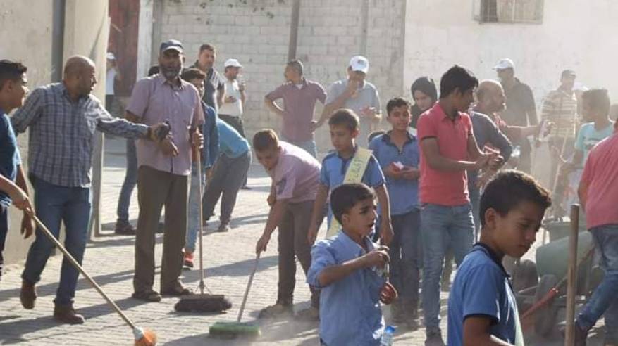 اللجنة الشعبية في خانيونس تطلق حملة  تنظيف وتشجير شوارع منطقة الحاووز