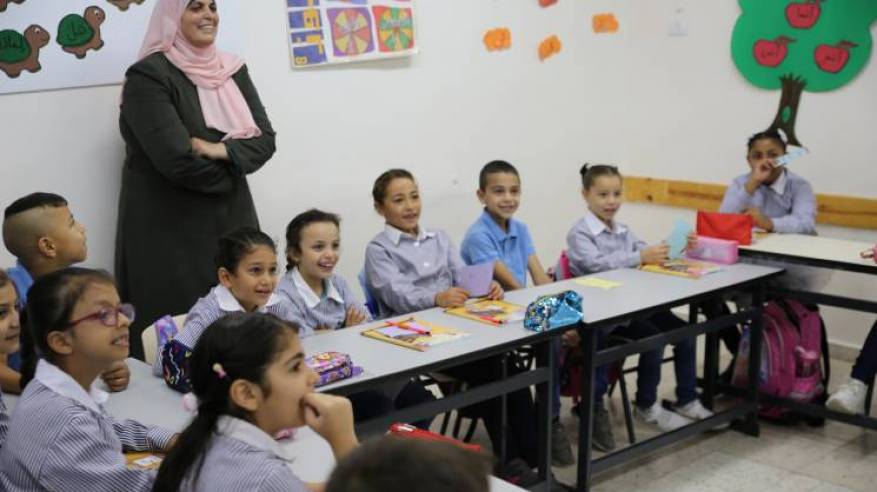 46,000 من الطلاب الفلسطينيين اللاجئين يعودون الى مدارسهم في الضفة الغربية