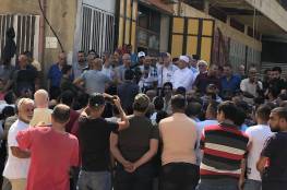 وقفة احتجاجية في مخيم نهر البارد رفضا لقرار وزارة العمل اللبنانية .