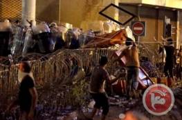 لبنان: عشرات الجرحى في مواجهات ورئيس الحكومة يهدد بالاستقالة