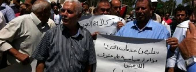 وقفة احتجاجية في مدينة رام الله امام مقر الامم المتحدة للمطالبة بالالتزام بمسؤوليتها اتجاه اللاجئين